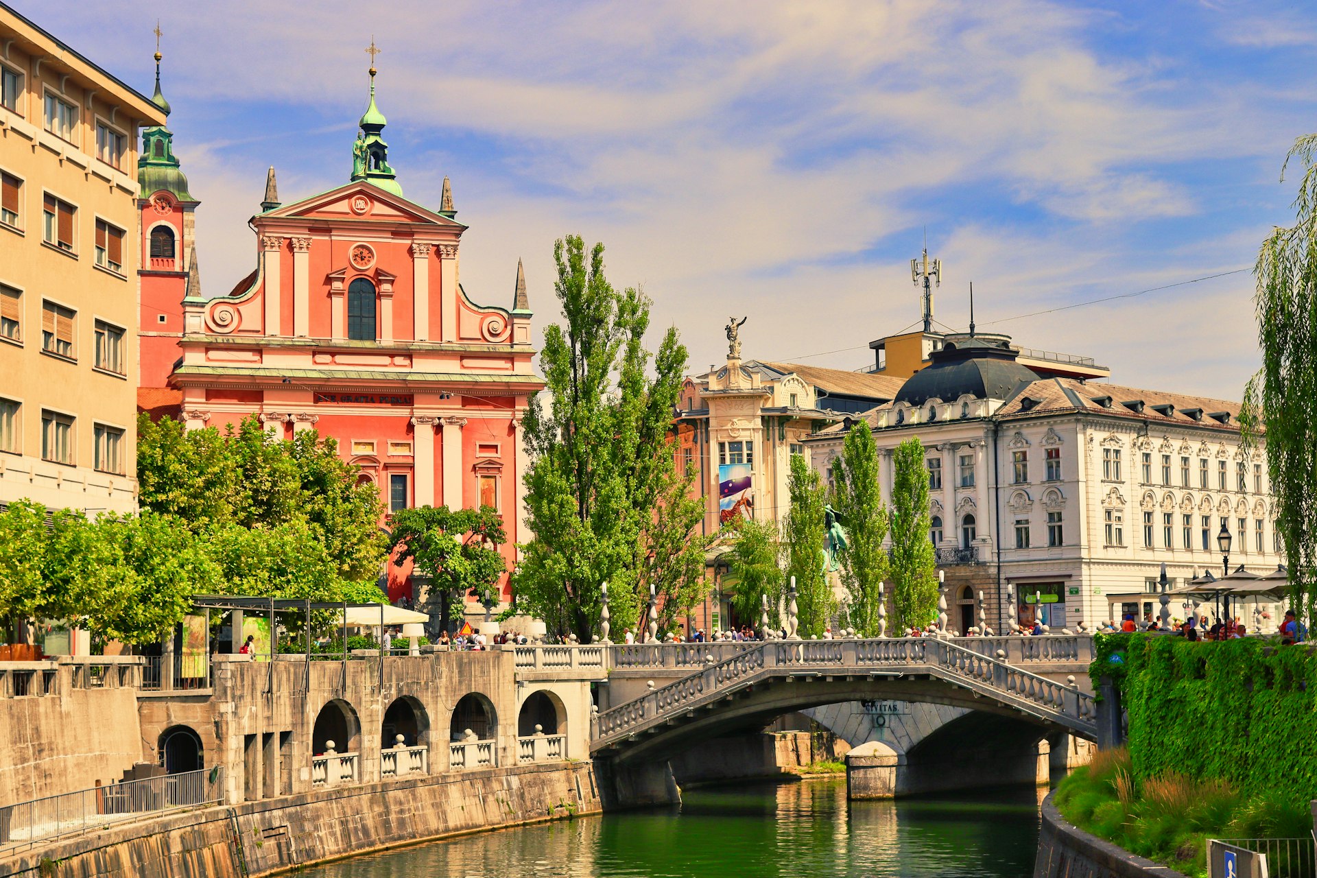 a bridge over a body of water in a city